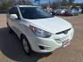 2011 WHITE /Black cloth & leather HYUNDAI TUCSON GLS Limited Auto AWD (KM8JUCAC2BU) with an 2.4L L4 DOHC 16V engine, 6-Speed Automatic transmission, located at 900 East Davis Street, Conroe, TX, 77301, (936) 539-9909, 30.314880, -95.446770 - Photo#6
